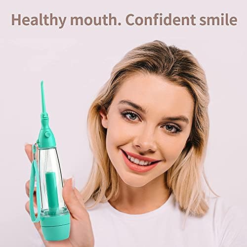 Green manual air pressure water flosser — photo 3