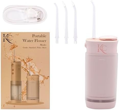 Pink travel friendly dental water flosser