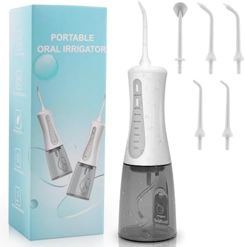 Cordless oral irrigator with large reservoir
