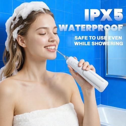 White battery operated oral irrigator — photo 5