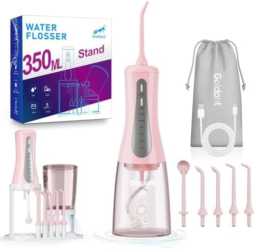 Pink water flosser with storage stand