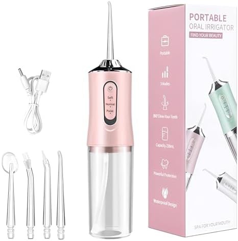 Pink portable flosser with precision water column