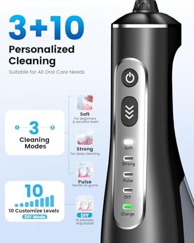 Portable cordless flosser with black accents — photo 3