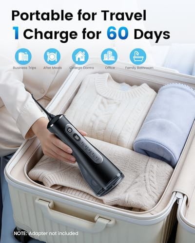 Portable cordless flosser with black accents — photo 4