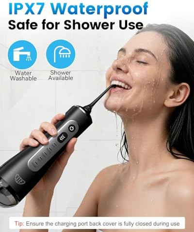 Portable cordless flosser with black accents — photo 5