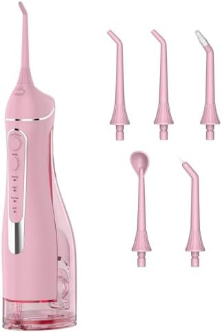 Pink cordless portable oral irrigator