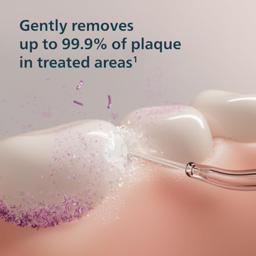Philips compact flosser 1000 portable water device — photo 3